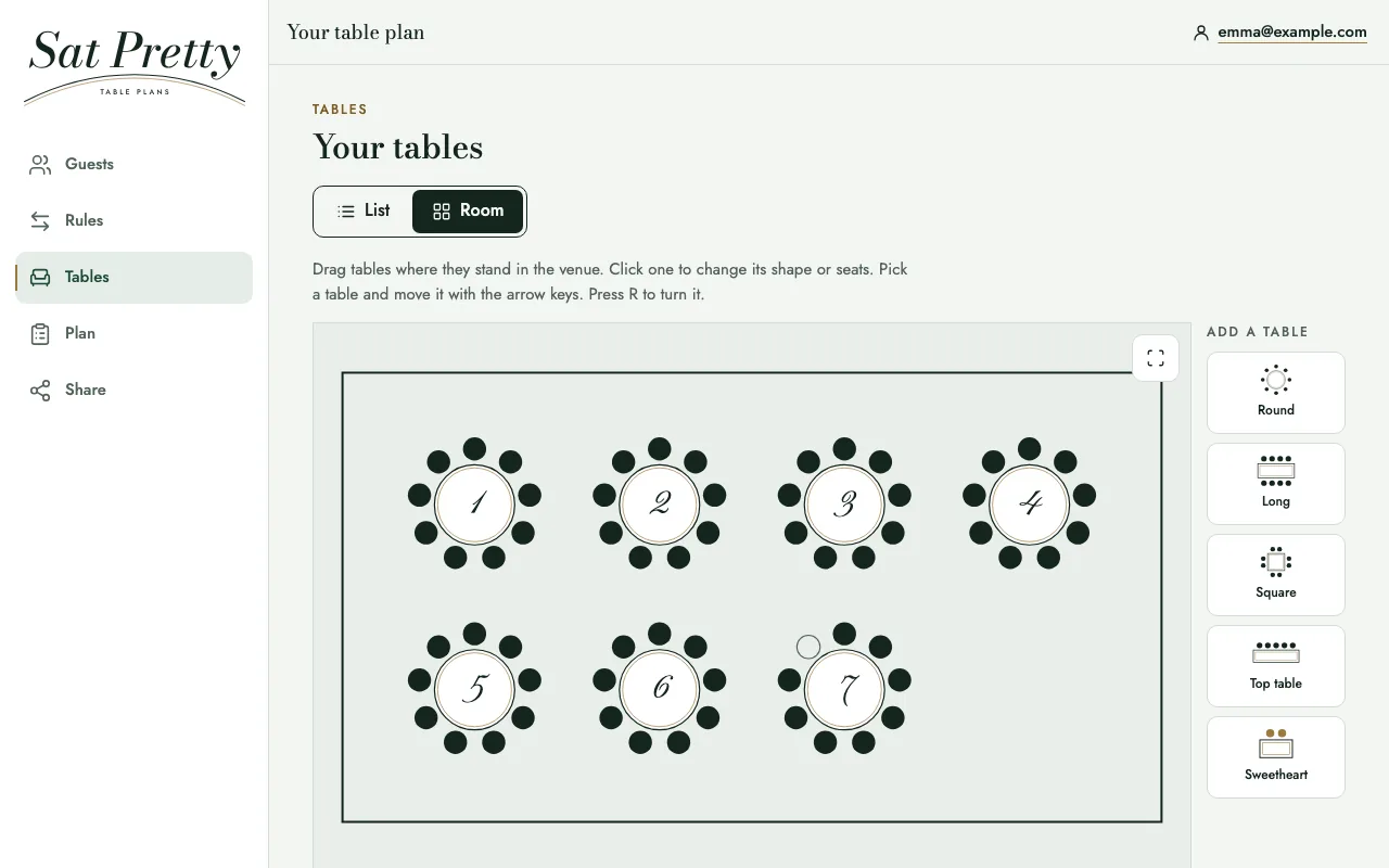 The room layout on a laptop. Seven numbered round tables stand in the room, with shapes to add on the right: round, long, square, top table and sweetheart.